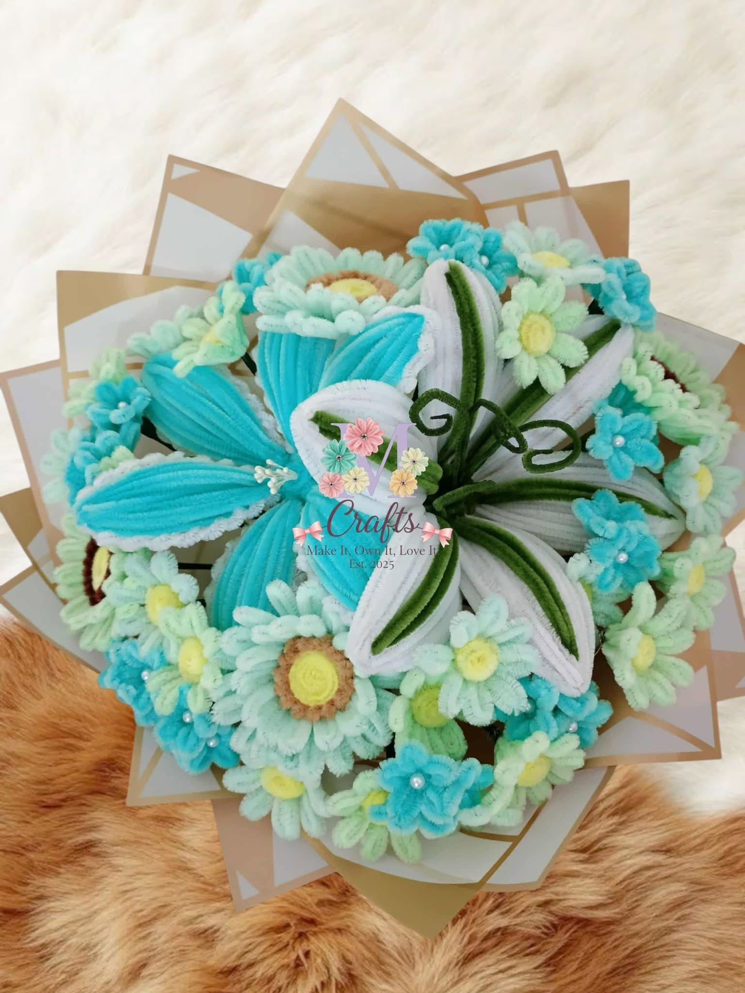 Big seafoam bouquet of fuzzy wire flowers — teal lily, mint daisies and blossoms in kraft wrap