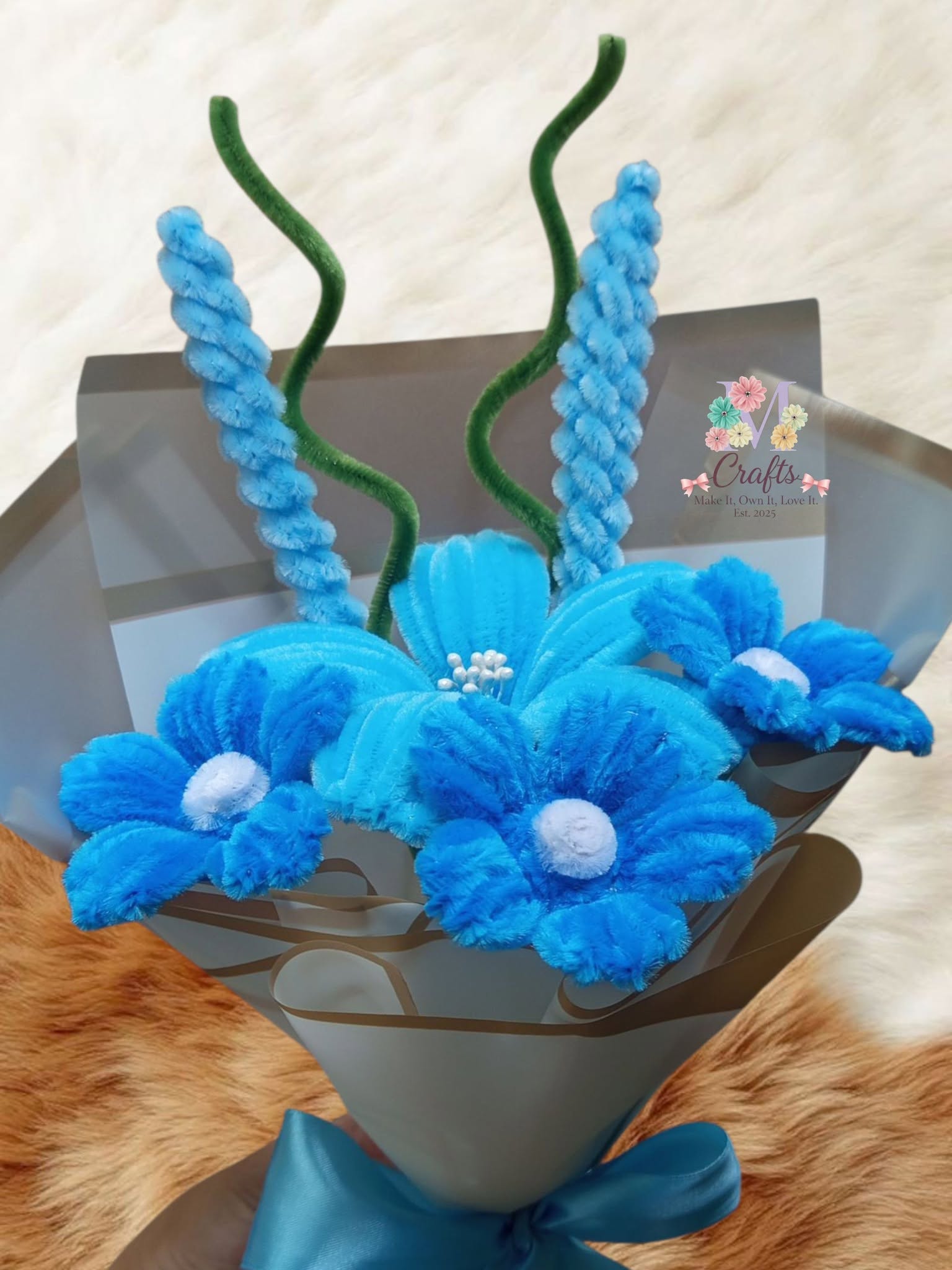 Mini blue bouquet with twisted spires and forget-me-nots in grey wrap